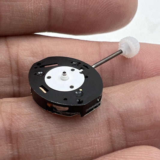 Sunon PE11 quartz watch repair parts showing 3 hands for precise timekeeping.