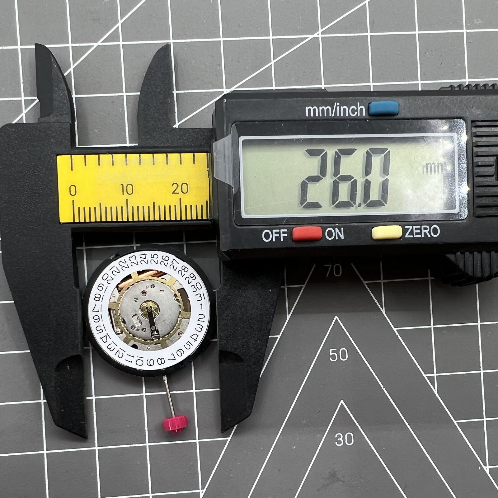 Swiss Made Ronda 715 quartz watch movement with date display, ideal for precision watch repairs and accessories.