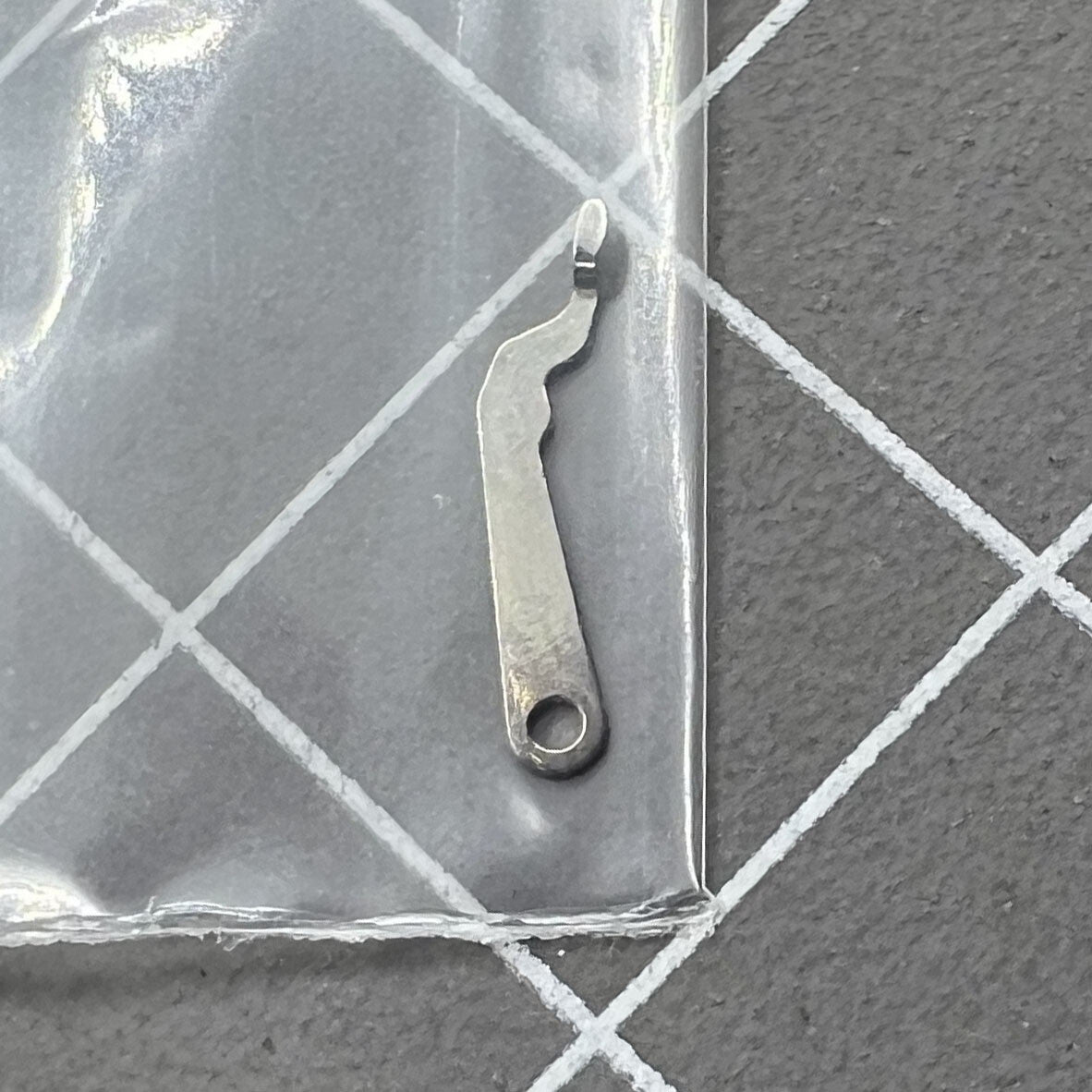 Replacement yoke for Rlx3135 sliding pinion, durable Rolex watch accessory ensuring precise timekeeping adjustment.