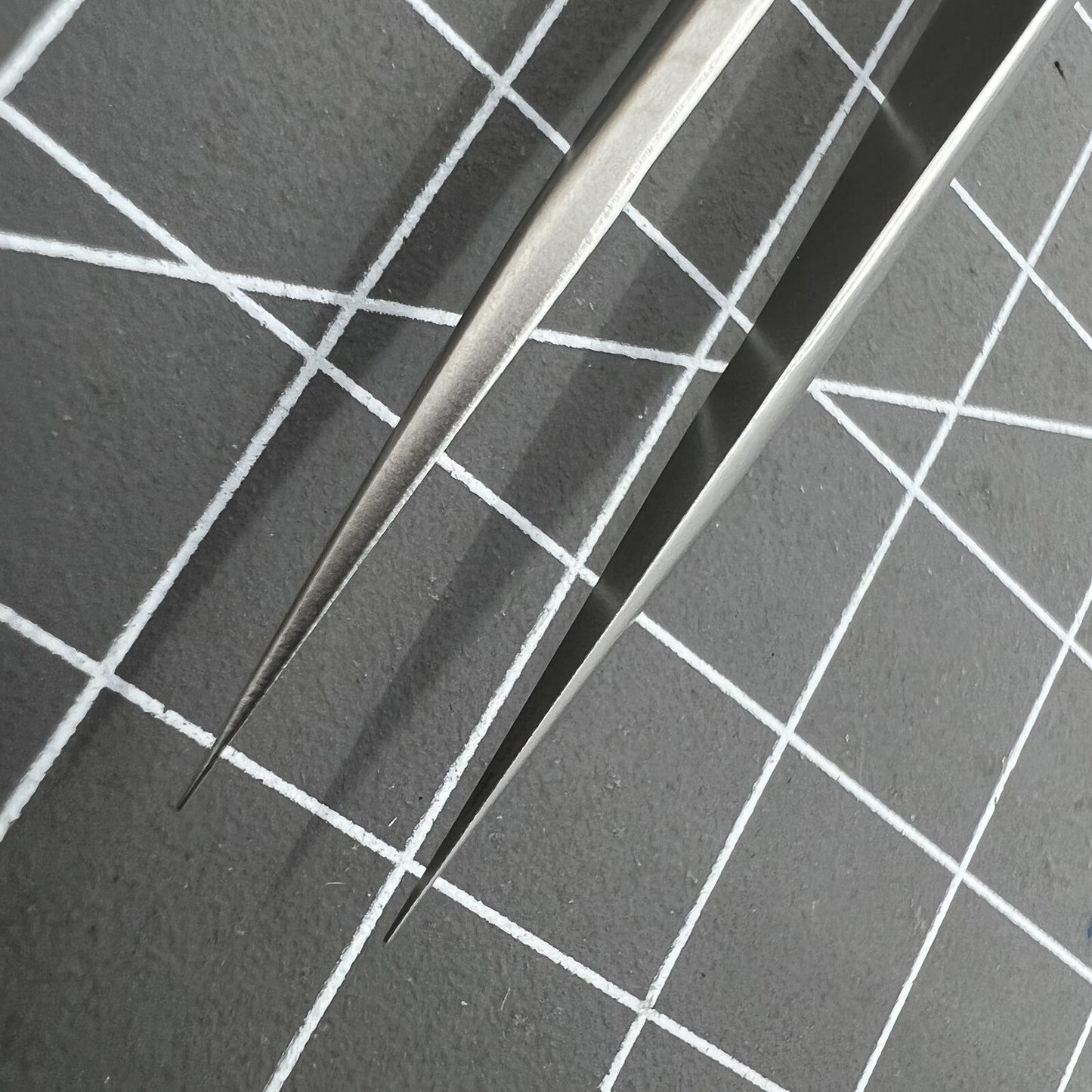 Bergeon 7026-3 antimagnetic tweezer for delicate hairspring adjustment in watch repair tools.