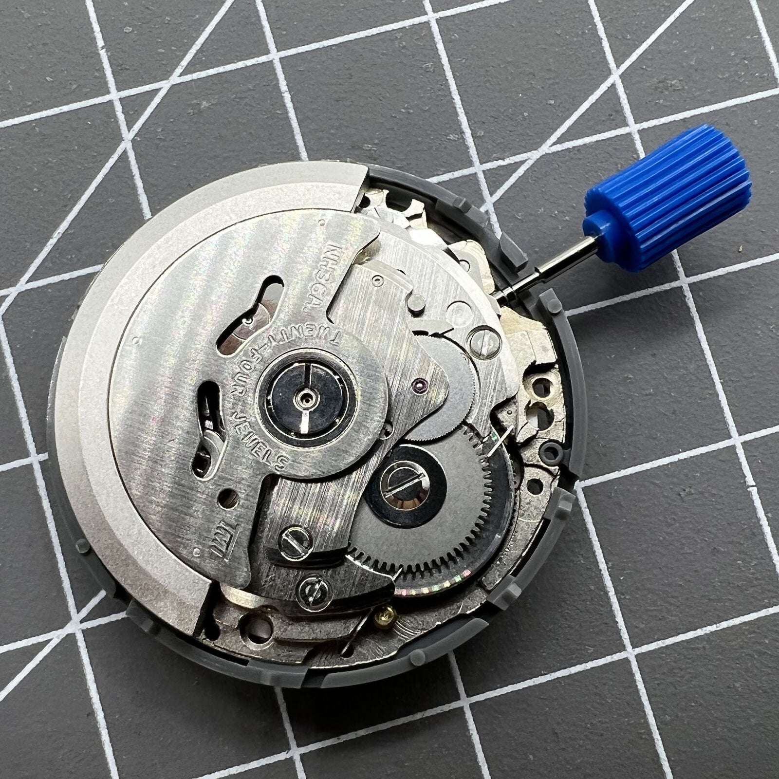 Japan NH36A watch movement with white dial, green lume, 3/3.8 crown, precise mechanical timekeeping by Seiko.