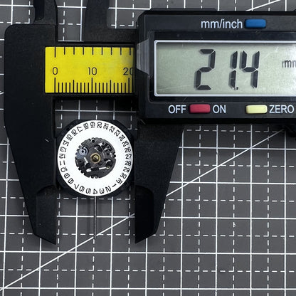 Seiko 7N32C Quartz watch movement showing three hands and single date at 3 o'clock for watch accessories.