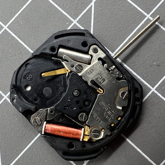 VX22 quartz watch movement by Seiko with white date disk at 3 o'clock, precision Japan-made replacement part.