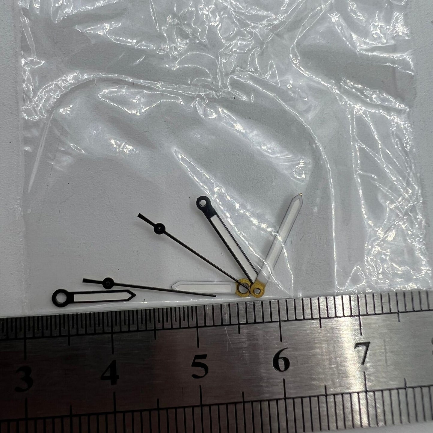 Luminous black watch hands, compatible with Miyota 2035 quartz, boosting visibility.