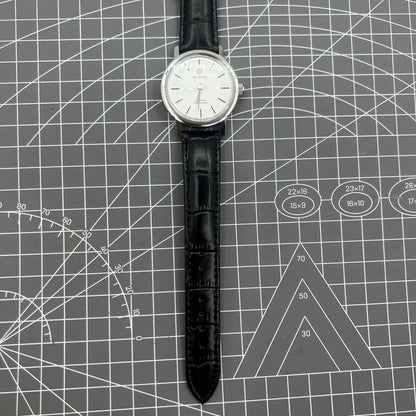 Baihua 37mm manual mechanical watch with silver dial, 19 jewels, shock-resistant for lasting performance.