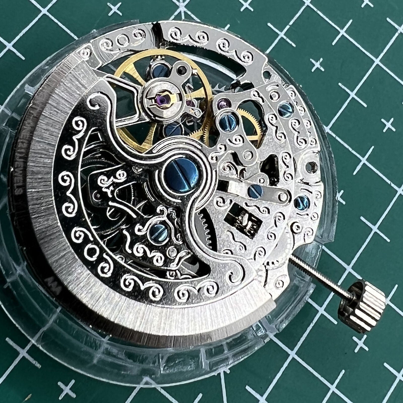 TY2807 skeleton automatic mechanical watch movement, detailed T16 replacement for precise timekeeping.
