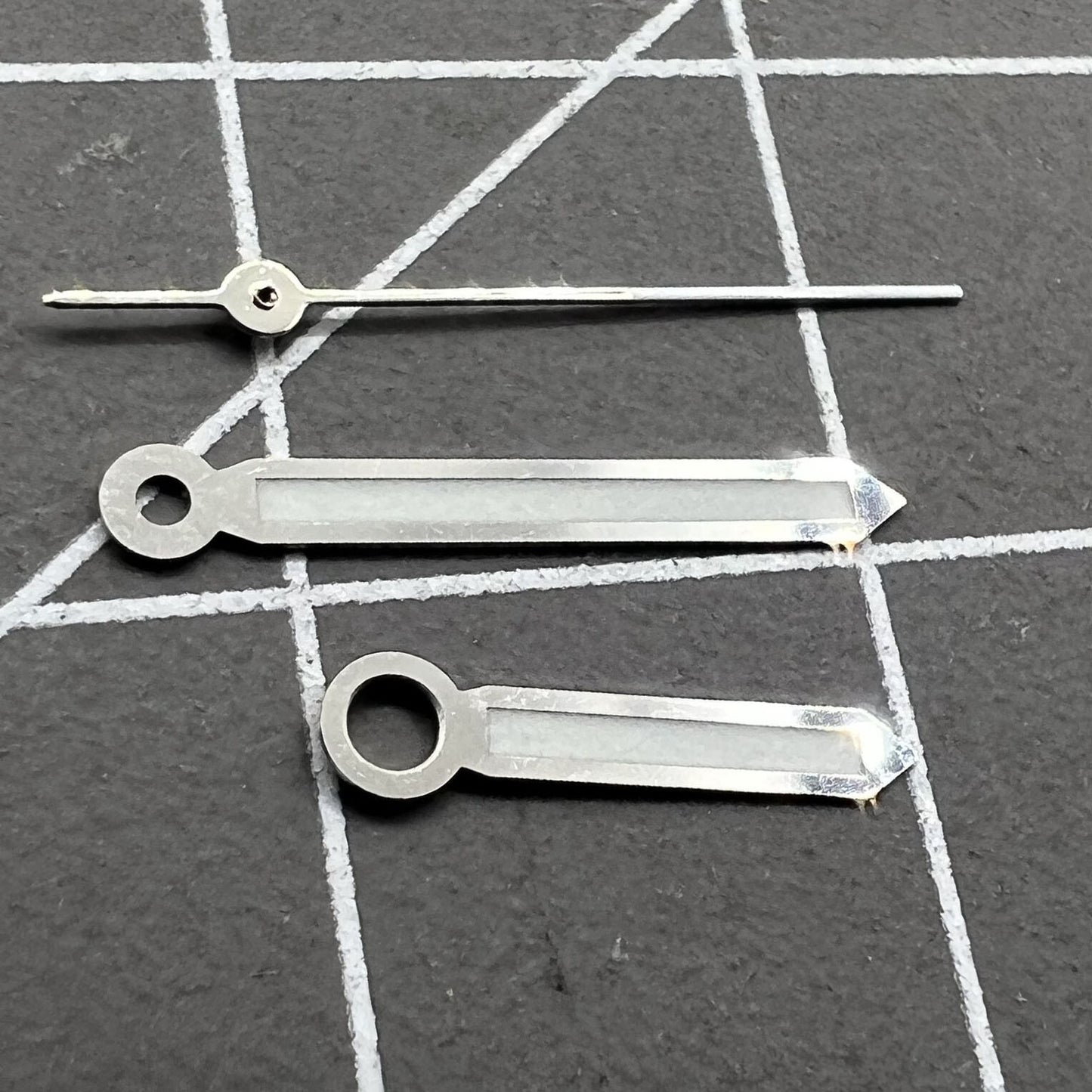 Set of 2 green luminous watch hands with silver trim for Miyota 2035, 2115, 2105, 2305 movements