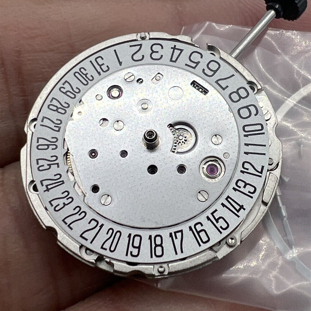 Miyota Citizen 9015 automatic mechanical movement with date display at 3 o?clock, precision watch part.