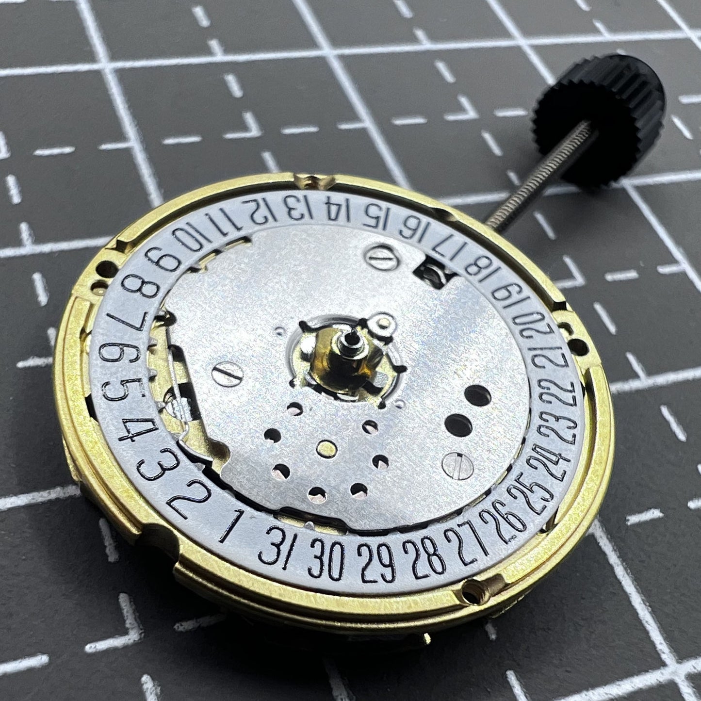 Swiss ETA F03.111 quartz watch movement with 3 hands and date at 6 o'clock, precision timekeeping.