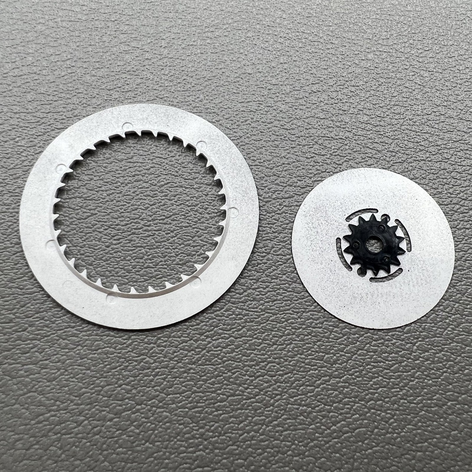 Black Arabic and English date and week wheel for NH36 movement, crown at 3 o'clock.