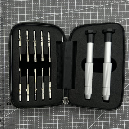 Precision screwdriver set with hex tools for watches and glasses repair, ergonomic grip.
