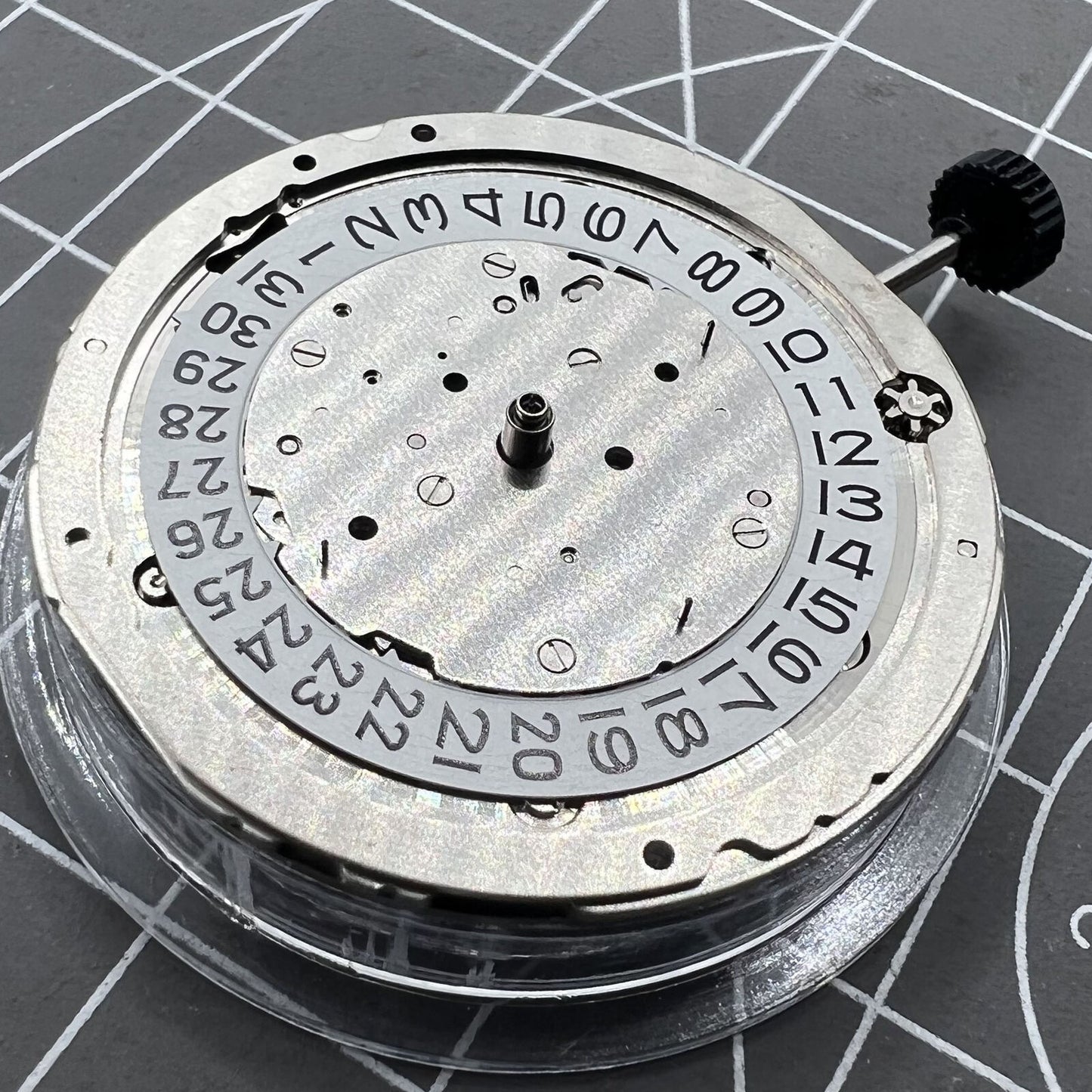 Miyota 9120 automatic watch movement showing date display at 4:30 for precise timekeeping.