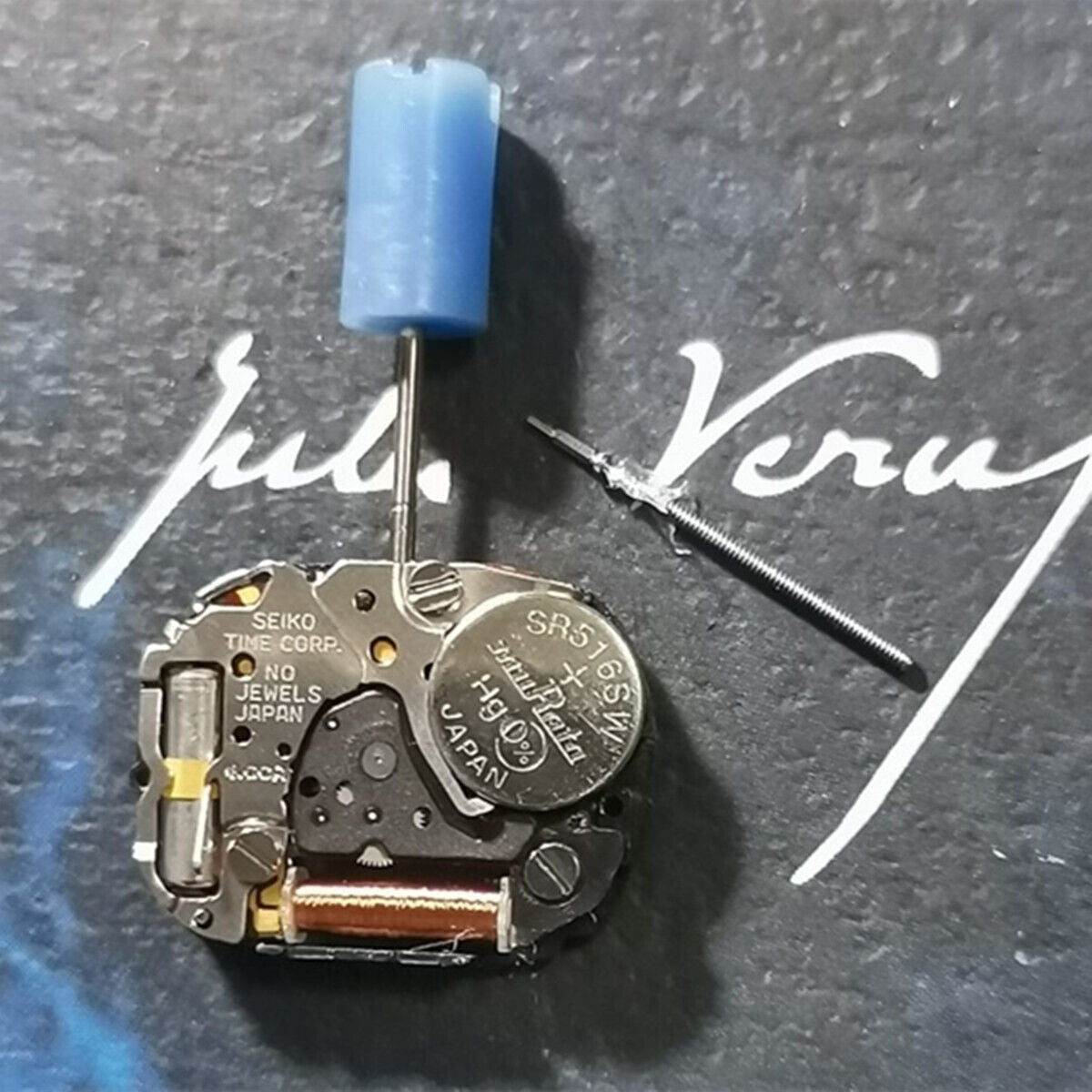 Old Stock 1N00A Japan quartz watch repair part with 2 hands, vintage accessory for timepiece restoration.