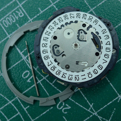 Hattori Epson TMI YM12 quartz watch movement for precise timekeeping, Japan made, ideal for watch repairs.