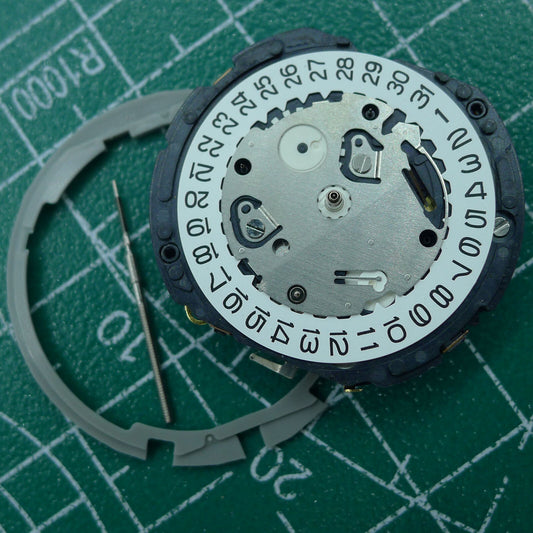 Hattori Epson TMI YM12 quartz watch movement for precise timekeeping, Japan made, ideal for watch repairs.
