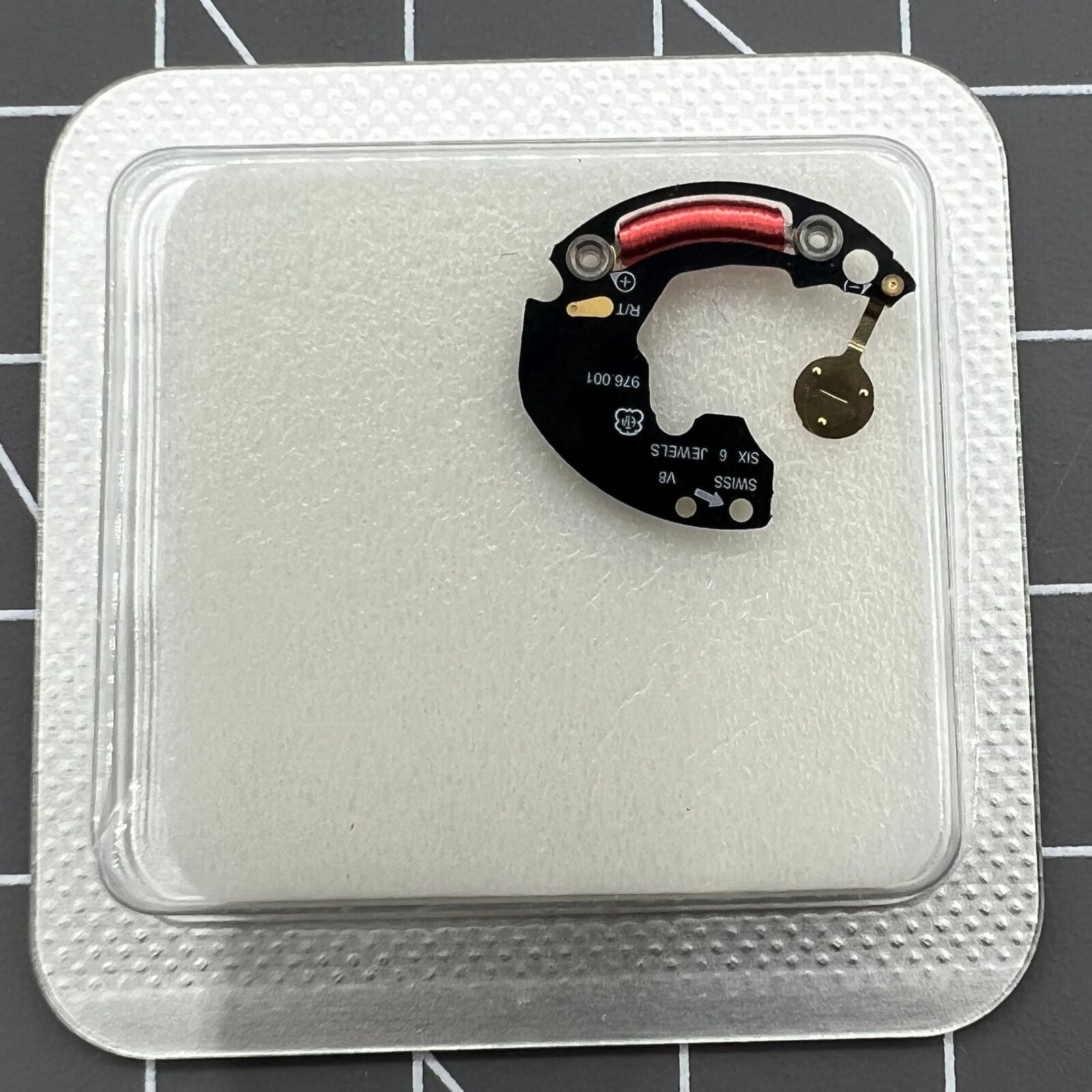 Circuit board for Swiss ETA 976.001 movement parts, compatible with precision watch repairs.