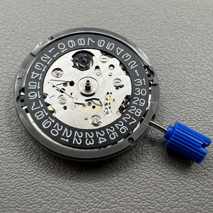 Japan NH35 automatic chronograph watch dial in black with date window and crown at 3 o?clock.