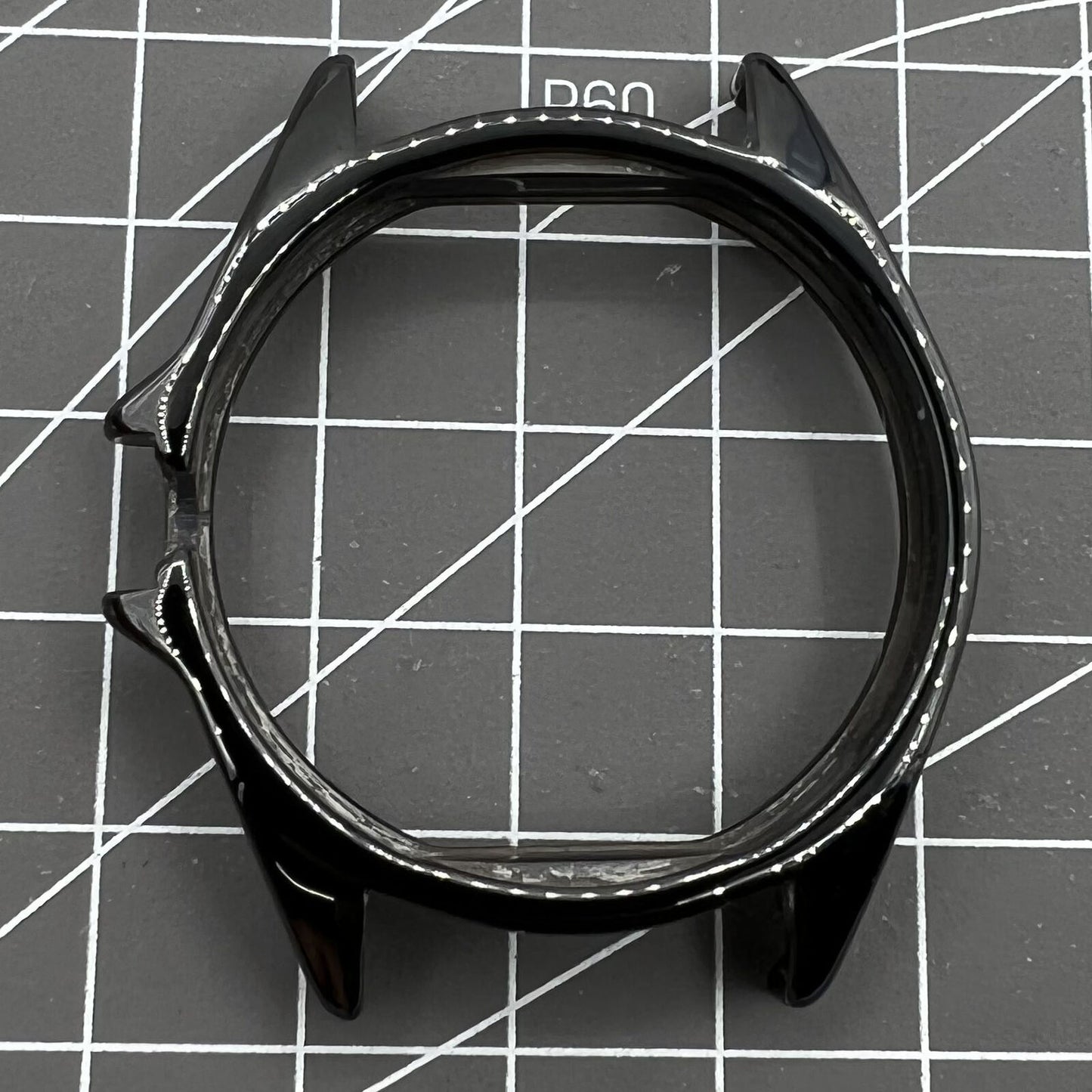 Black ceramic watch case replacement for men's J12 watch by Chanel, durable and stylish accessory.