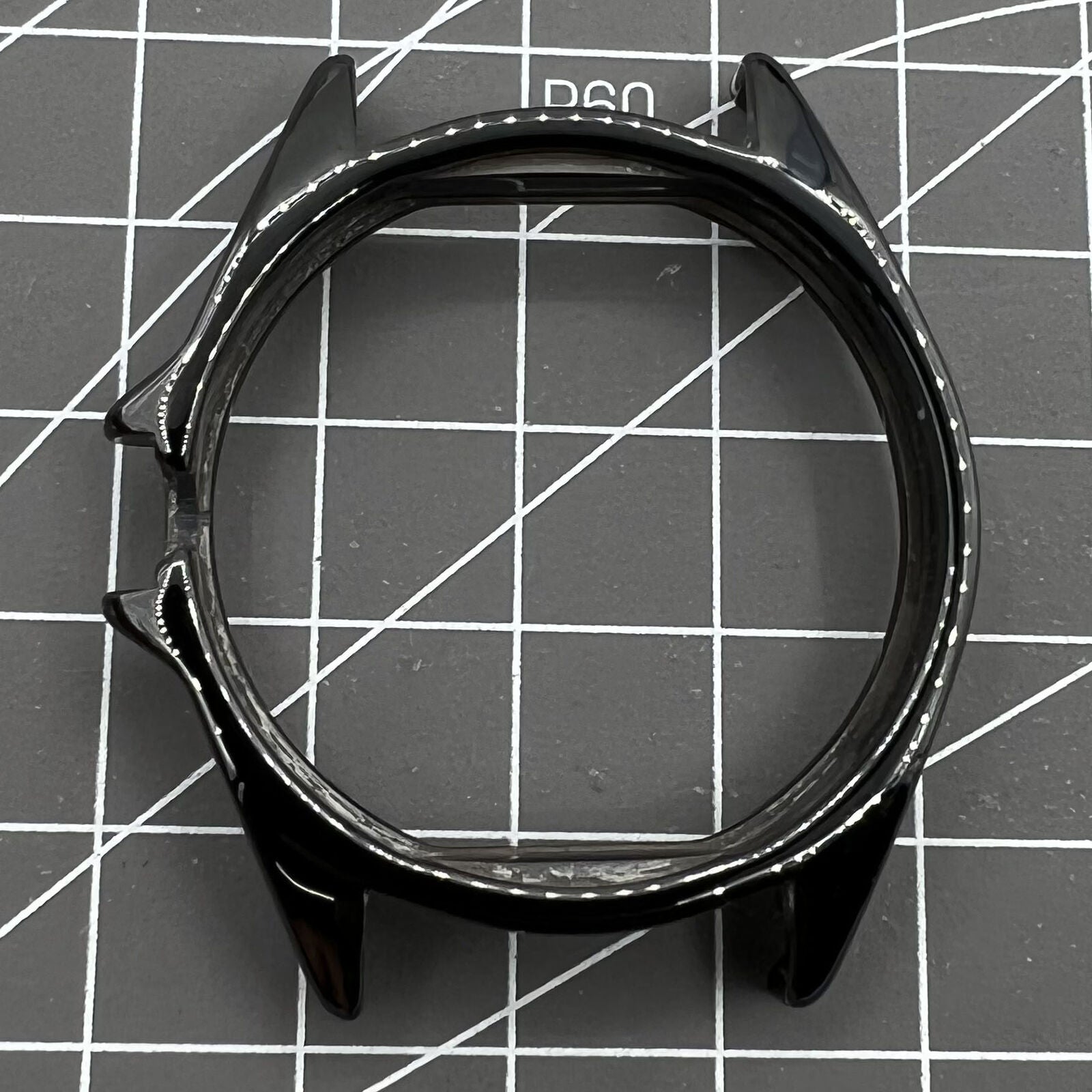 Black ceramic watch case replacement for men's J12 watch by Chanel, durable and stylish accessory.