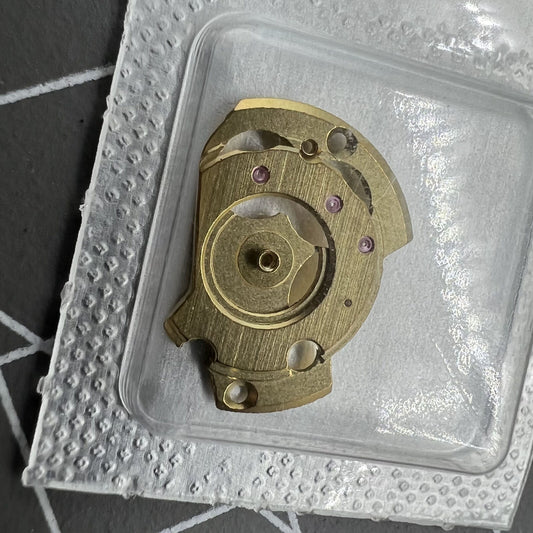 Golden automatic watch wheel bridge spare part for ETA 2671 movement, Swiss Made precision component.