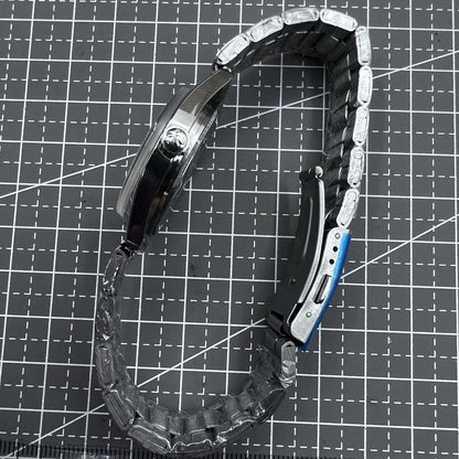 32mm silver HONGLIAN manual watch with 17 jewels and classic Roman numeral dial design for elegant style.