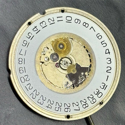 Swiss Made ETA955.114 quartz watch part showing single calendar date at 3 o'clock for repair and replacement.