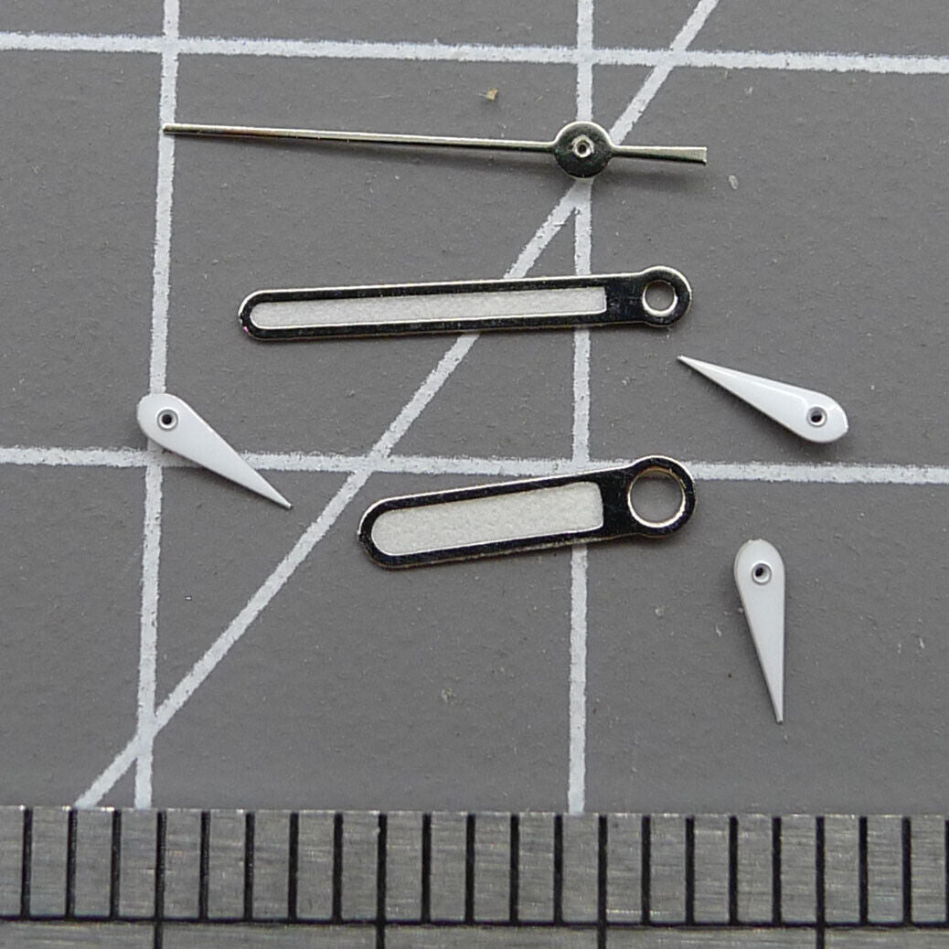 Silver-trimmed green luminous watch hands, 10mm, designed for Miyota 0S10 movement, perfect for precision timepieces.