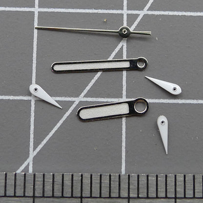 Silver-trimmed green luminous watch hands, 10mm, designed for Miyota 0S10 movement, perfect for precision timepieces.