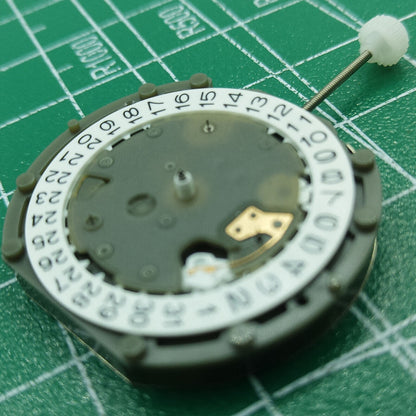 Sunon PE50 quartz watch movement showing date at 3 o'clock and small seconds at 2, 6, and 10 positions.