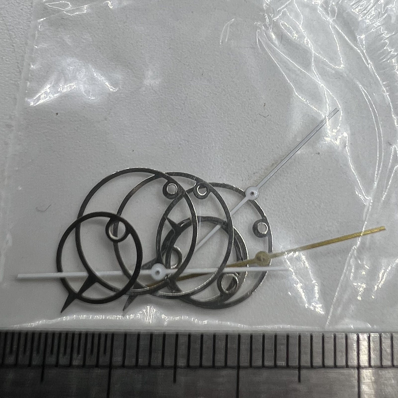 11mm pointed watch hands with irregular design for Miyota 2035,. Stylish and precise accessory.