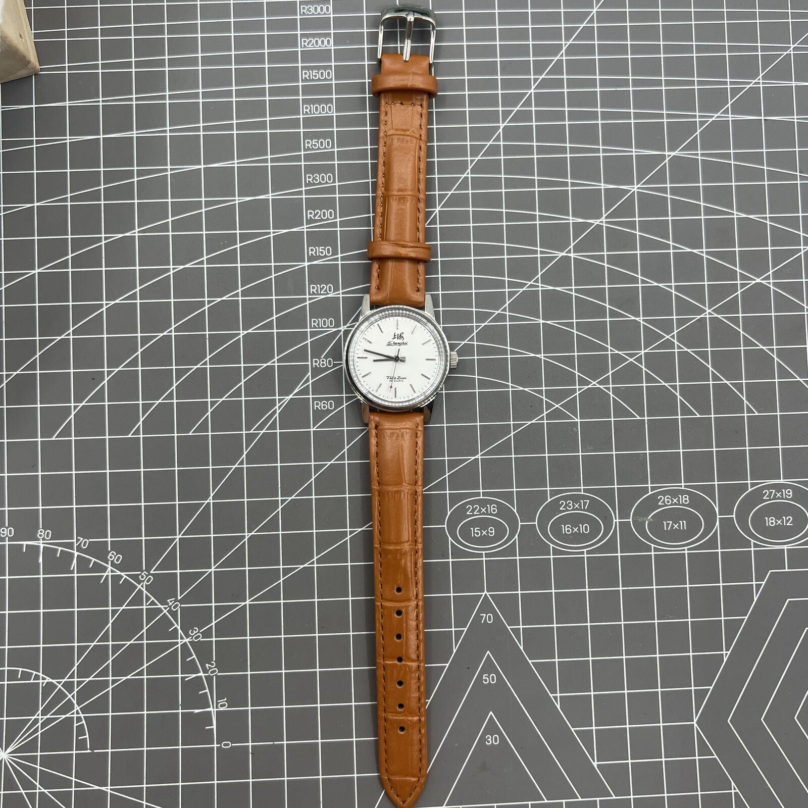 32mm Shanghai Factory manual mechanical watch with silver case and silver hour markers, classic design