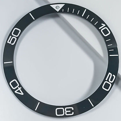 Ceramic blue luminous 38.5mm bezel ring by Conquest, designed for durability and stylish watch enhancement.