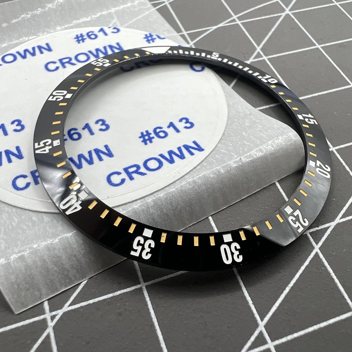 Black ceramic watch bezel insert with yellow graduation for 38mm/30.5mm watches, durable replacement part.