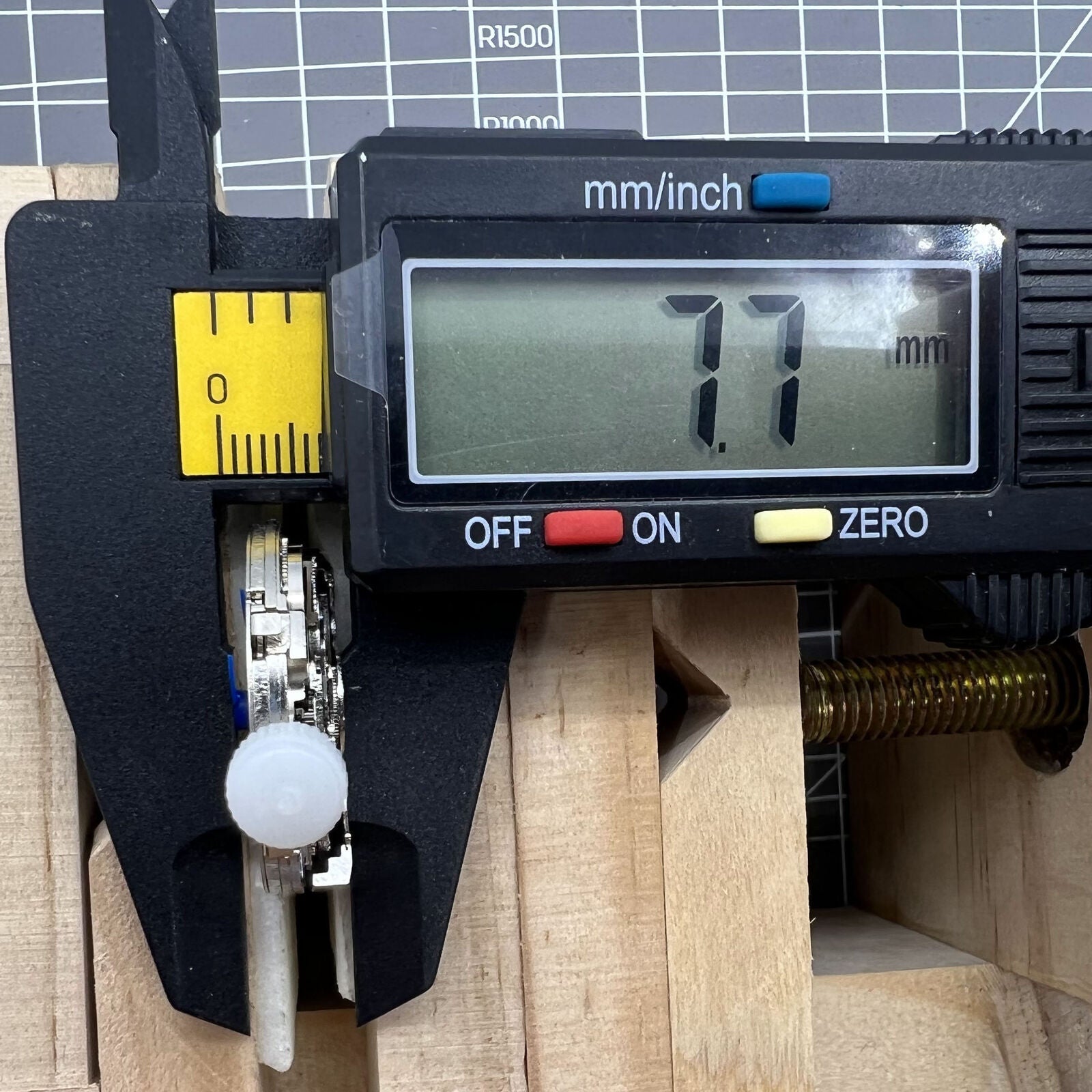 ST10 automatic mechanical watch accessory with date display and small seconds at 3, 6, 9, and 12 positions.