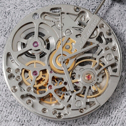 China Made 24 Jewels SL-2201C watch with hollow dial, automatic mechanical movement, and three hands design.