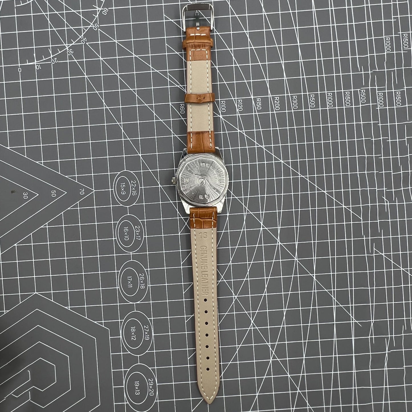 33mm Chunlan manual steel watch with silver dial, 17-jewel movement, and sleek stainless steel band.