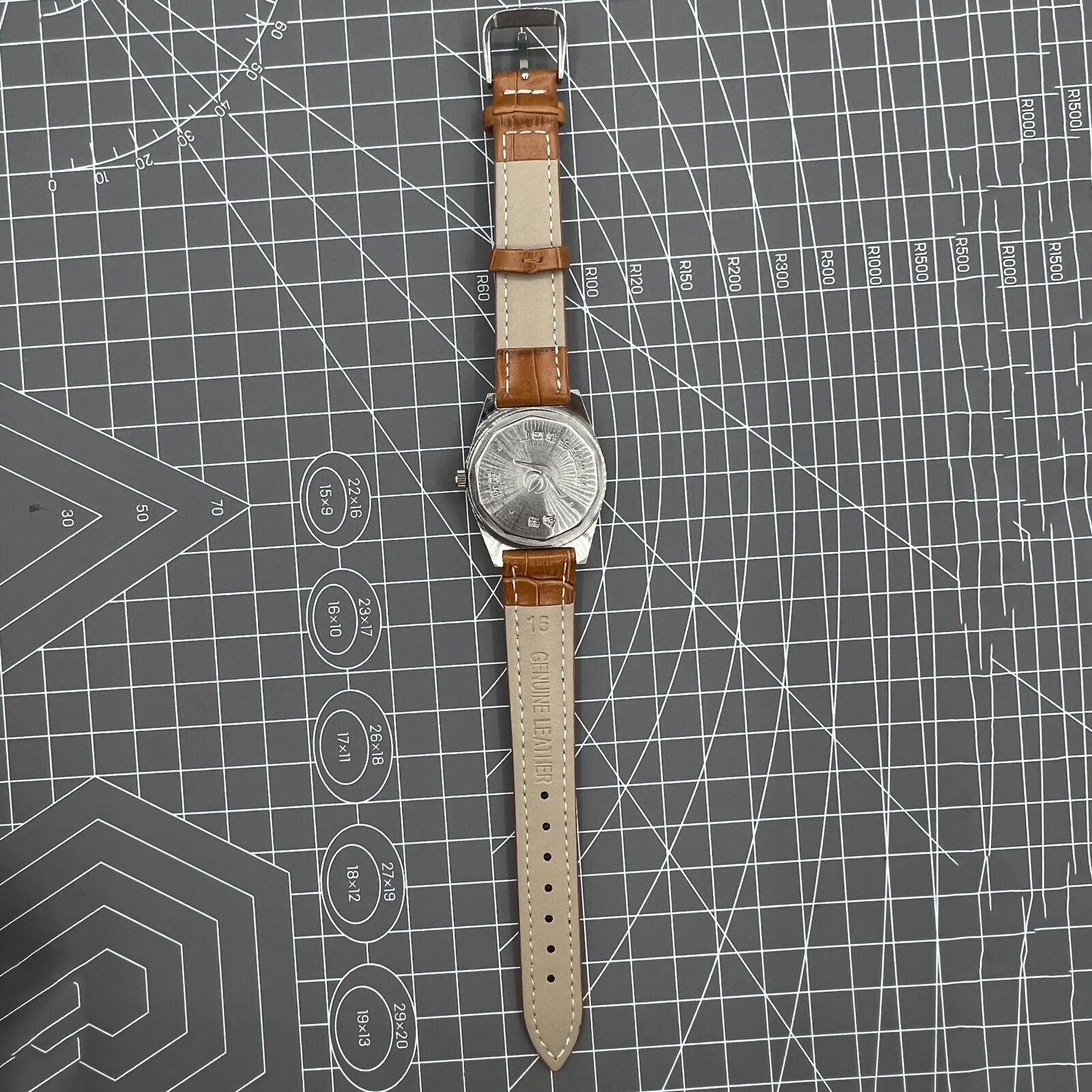 33mm Chunlan manual steel watch with silver dial, 17-jewel movement, and sleek stainless steel band.