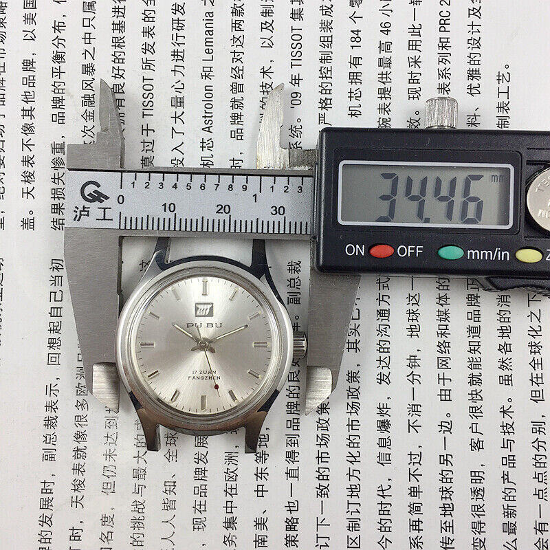 PUBU 32mm manual mechanical watch with grey dial, nail markers, 17 jewels, precision craftsmanship for timeless style.