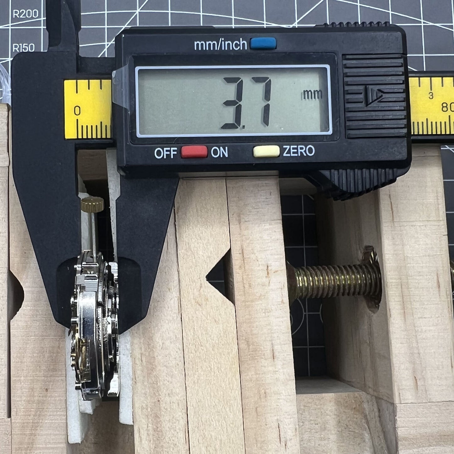 Brand Name automatic multifunctional watch with mechanical movement, date display at 12 o'clock, and exposed bare wheel at 6.