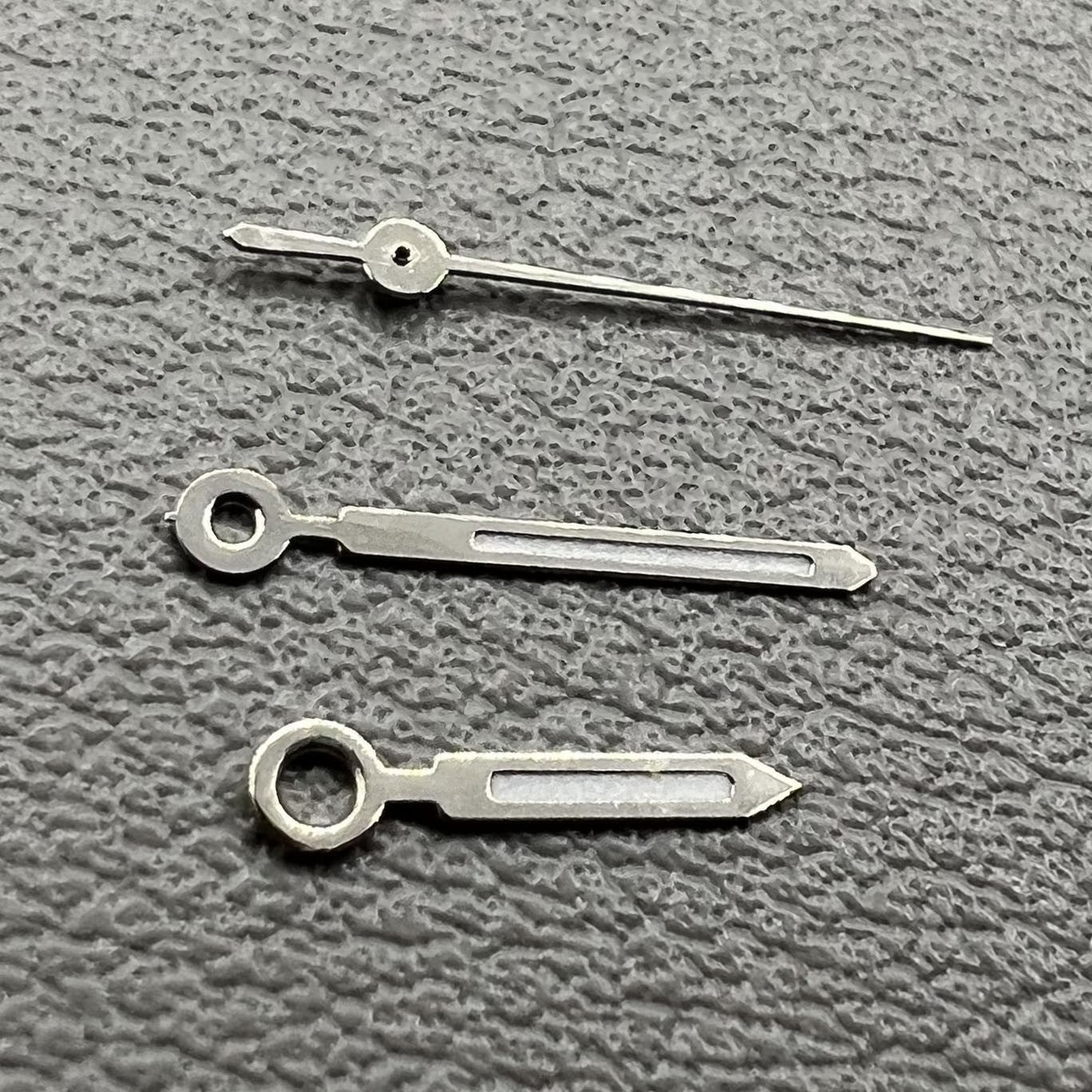 Silver trim green lume square tip watch hands set for Miyota 6M12, 2 sets/pack, ideal for precise time repair.