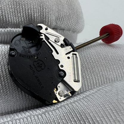 Swiss Made ETA 802.102 quartz watch movement with three hands, precision engineered for accurate timekeeping in luxury watches.