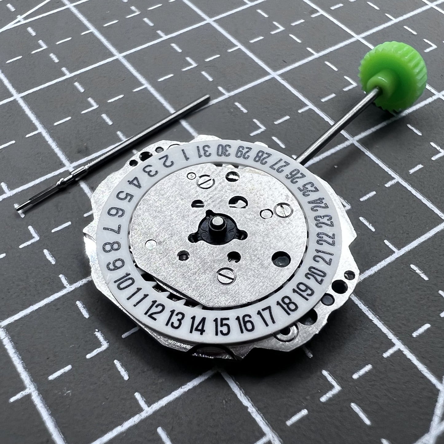 Miyota Japan 4T74 quartz movement with single hand and date at 6 o?clock, ideal for precise watch repairs.