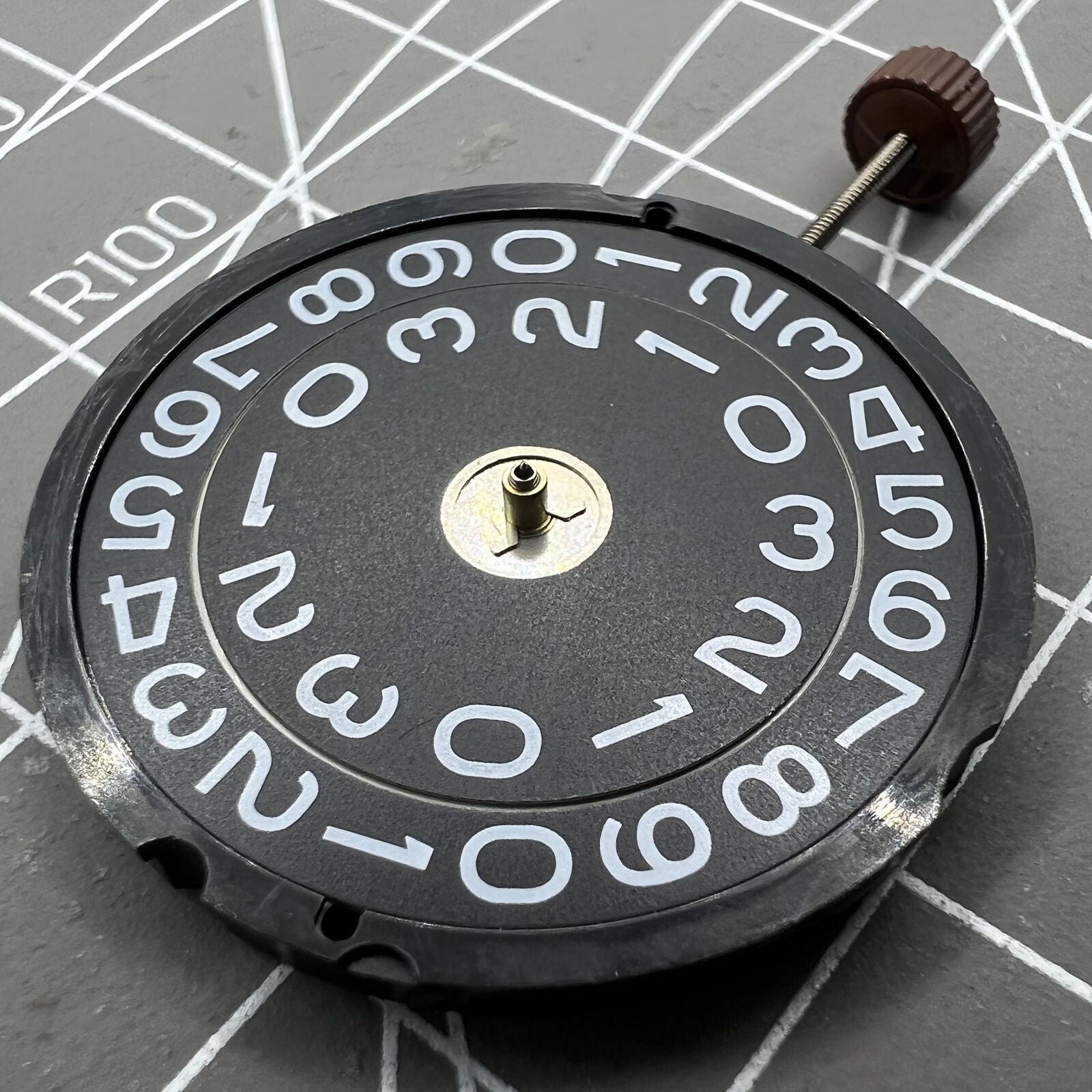 Swiss Made Ronda 519 black quartz watch movement for precise timekeeping and durability.