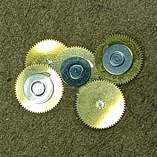 Close-up of ETA 2824 date indicator driving wheel, precision watch repair part.