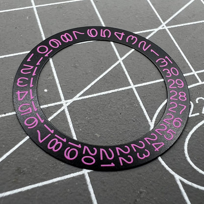 Pink character date disk overlay for NH35 NH36 watch movement on black background, enhancing brand recognition.