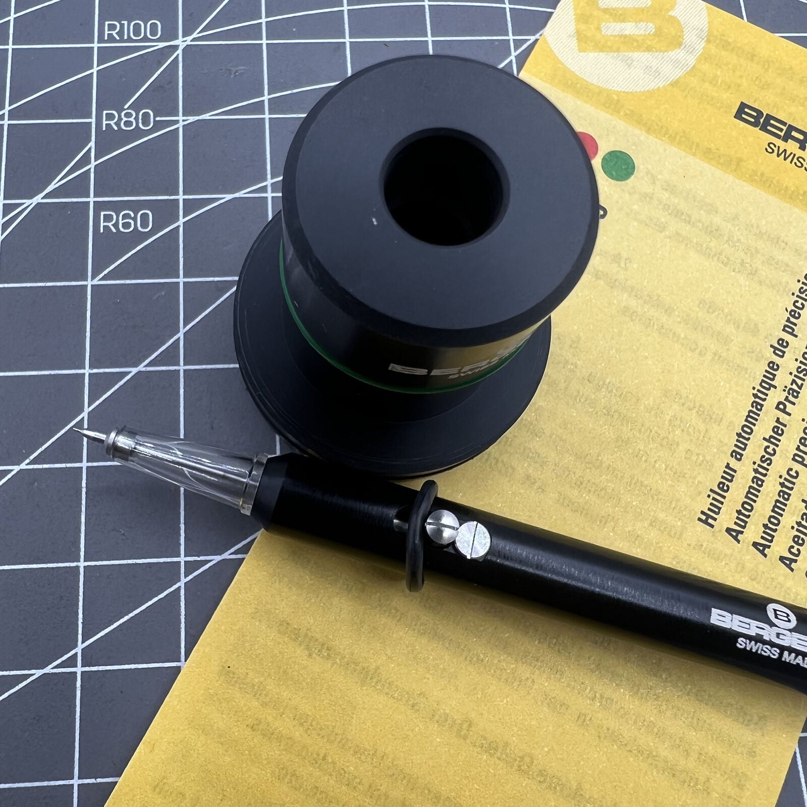 Swiss Bergeon 7720-5 No. 5 automatic oiler tool for precise watch and clock maintenance tasks.