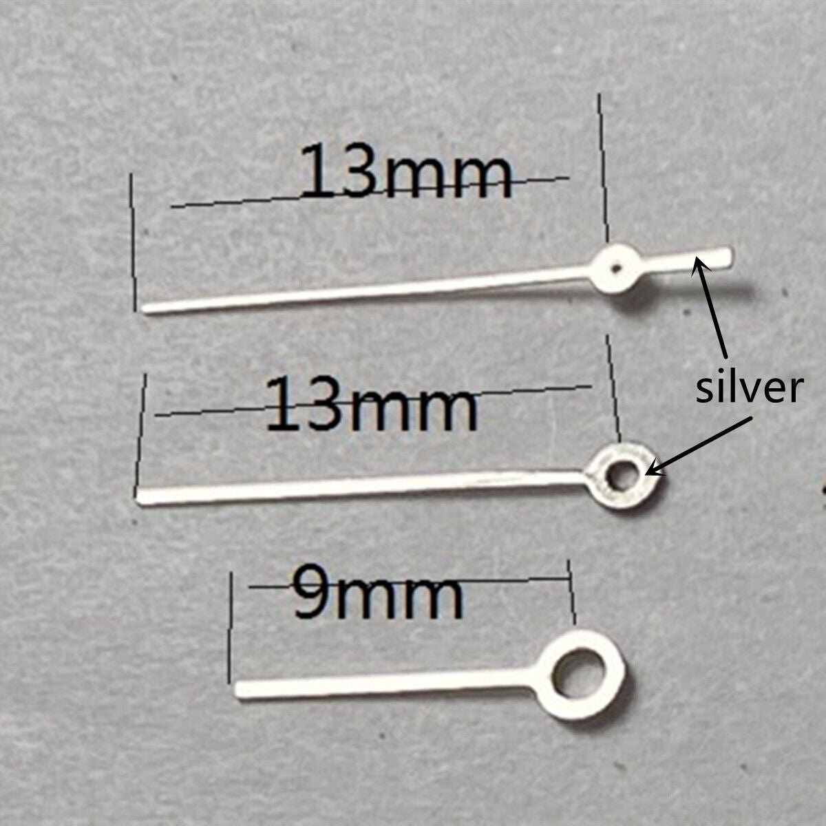 13mm silver trim watch hands by Miyota, compatible with models 2315, 2035, 2036, 2115, 2305.