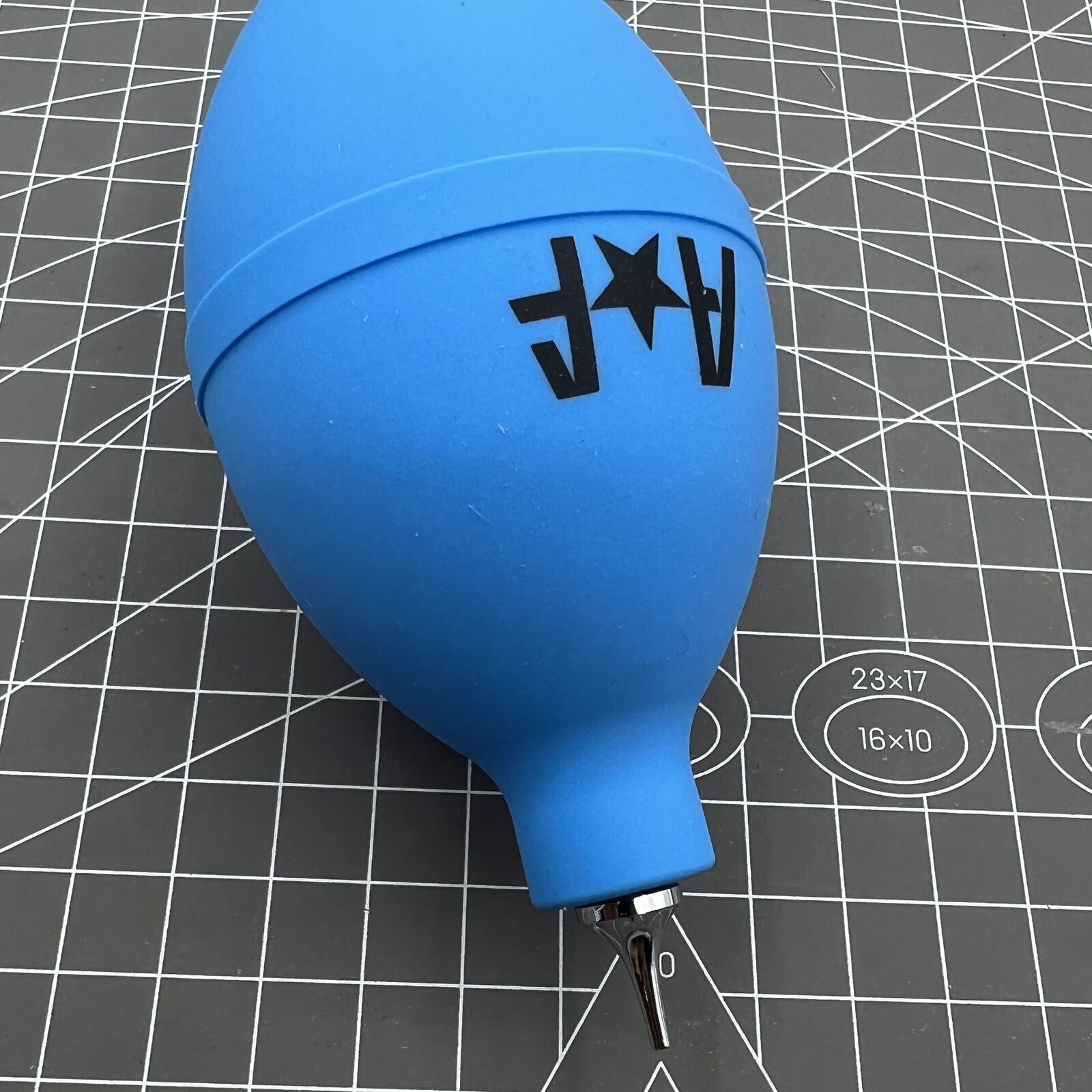 A*F 18666 Air Dust Pump Cleaner blowing dust from watch parts for accurate maintenance