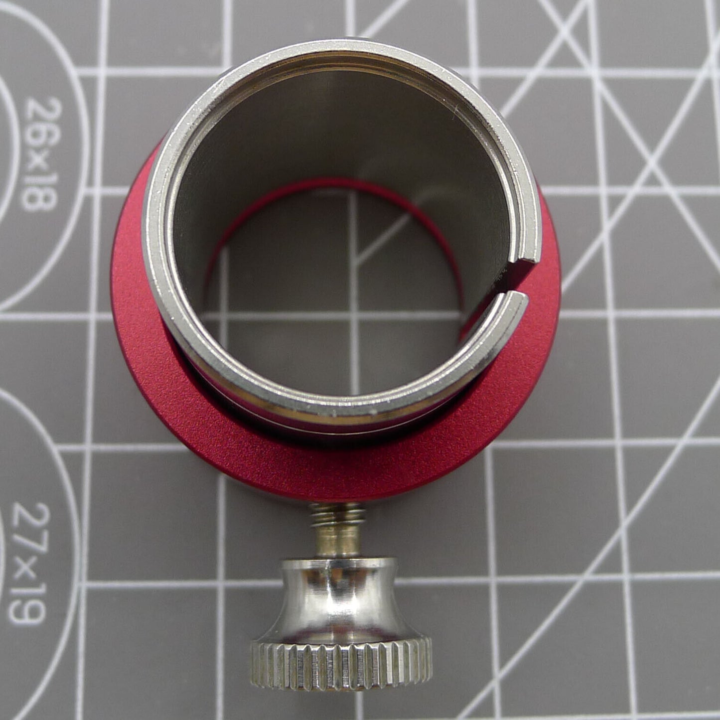 Reversible ETA Movement Holder with Knob, securing ETA 2000 watch movements for precise repair tasks.