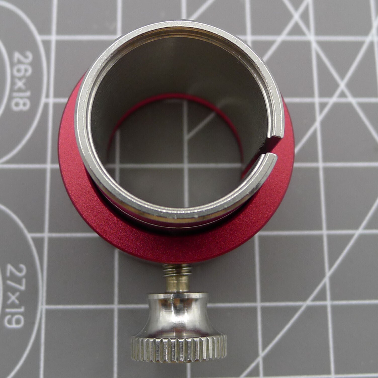 Reversible ETA Movement Holder with Knob, securing ETA 2000 watch movements for precise repair tasks.